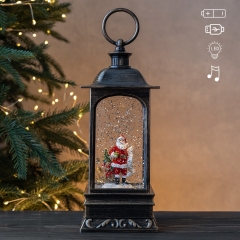 Новорічний ліхтар з підсвіткою та музикою "Санта й новорічні дива", 27 см (9240-020)