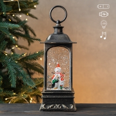 Новорічний ліхтар з підсвіткою та музикою "Сніговик з теплим серцем", 27 см (9240-021)