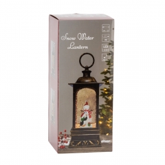 Новорічний ліхтар з підсвіткою та музикою "Сніговик з теплим серцем", 27 см (9240-021)